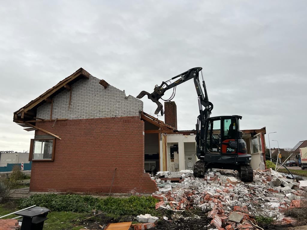 Sloopwerk met graafmachine